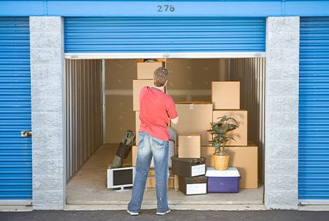 man storing his household items in a self-service storage center decatur illinois
